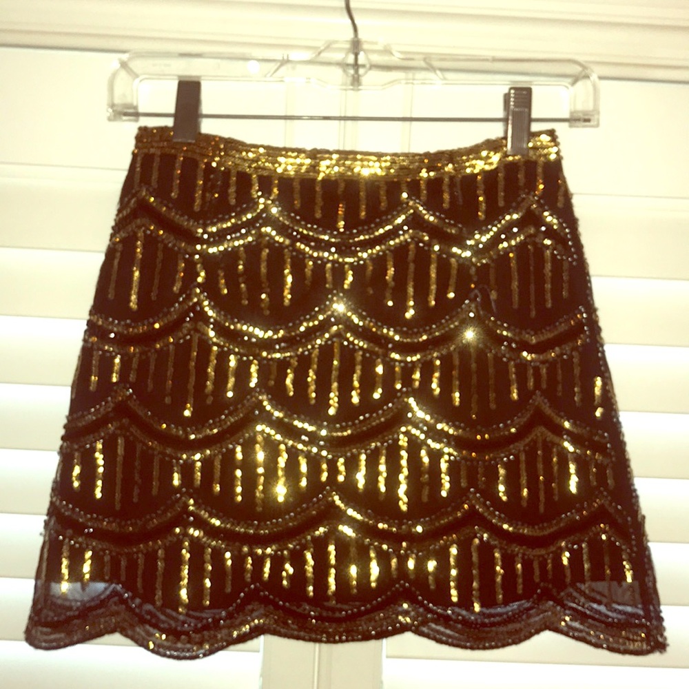 Gianni Bini black skirt with gold sequins